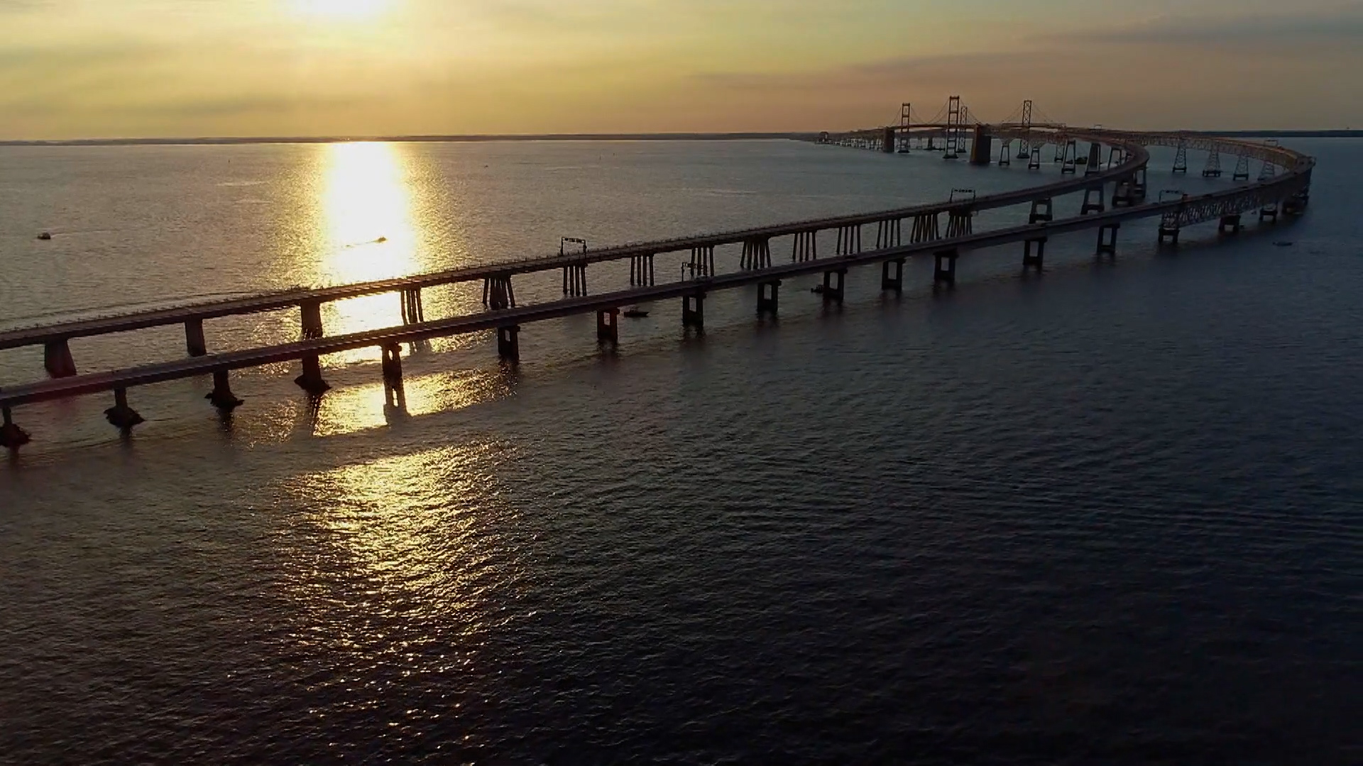 Aerial view of bay bridge at sunset
